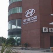 Hyundai:stainless-steel box logo on building